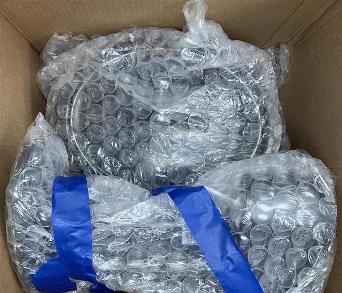 Once the items were sanitized we carefully wrapped them in bubble wrap to ensure protection. 