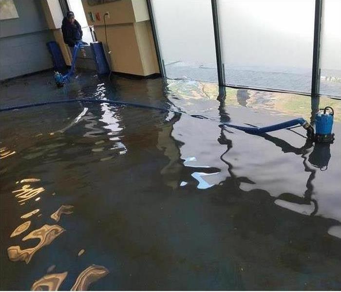 Water covers the entire surface of the floor. 